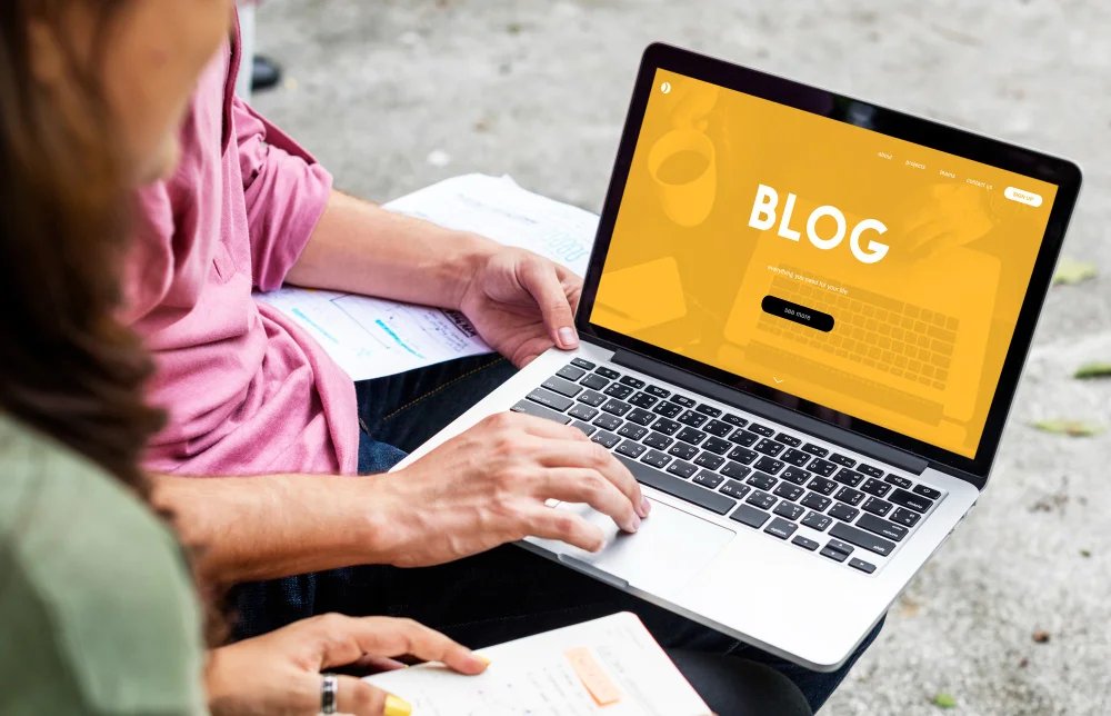 Professional reviewing blog content on laptop for guest post placement, representing home improvement SEO guest posting strategy to build quality backlinks for contractor websites